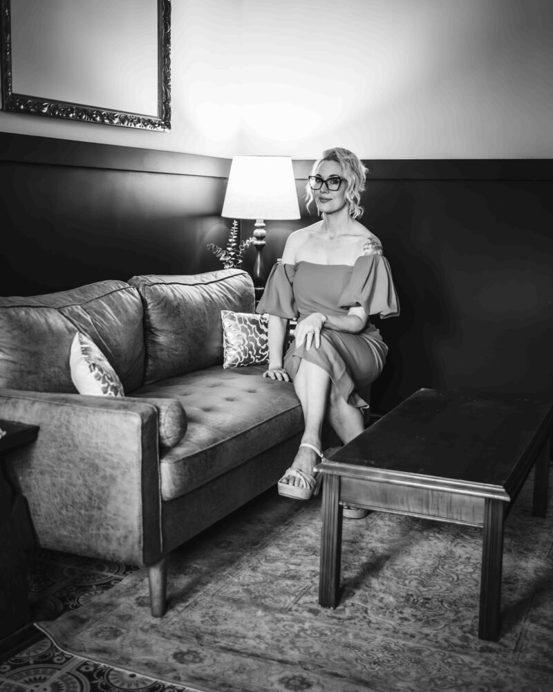 Owner of Indianapolis wedding hair and makeup company smiling while working