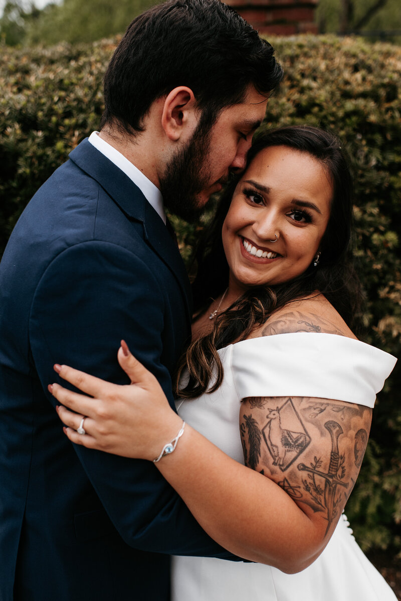 Bride and groom walk up memorial steps at their DC wedding