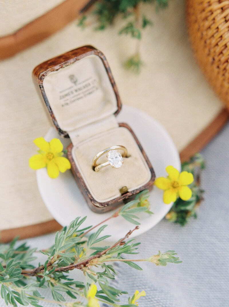 A Sarah O ring is photographed in a vintage ring box by Aspen Colorado engagement photographer Mary Ann Craddock.
