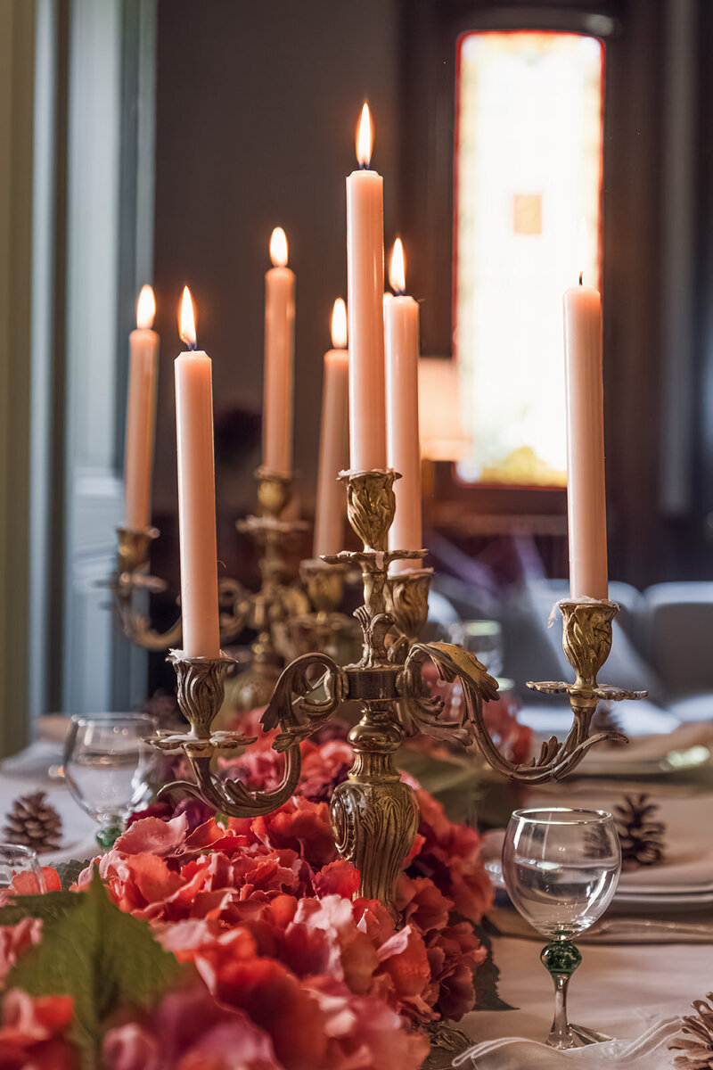 Chateau Charente dining table with candles and fresh flowers for retreat guests
