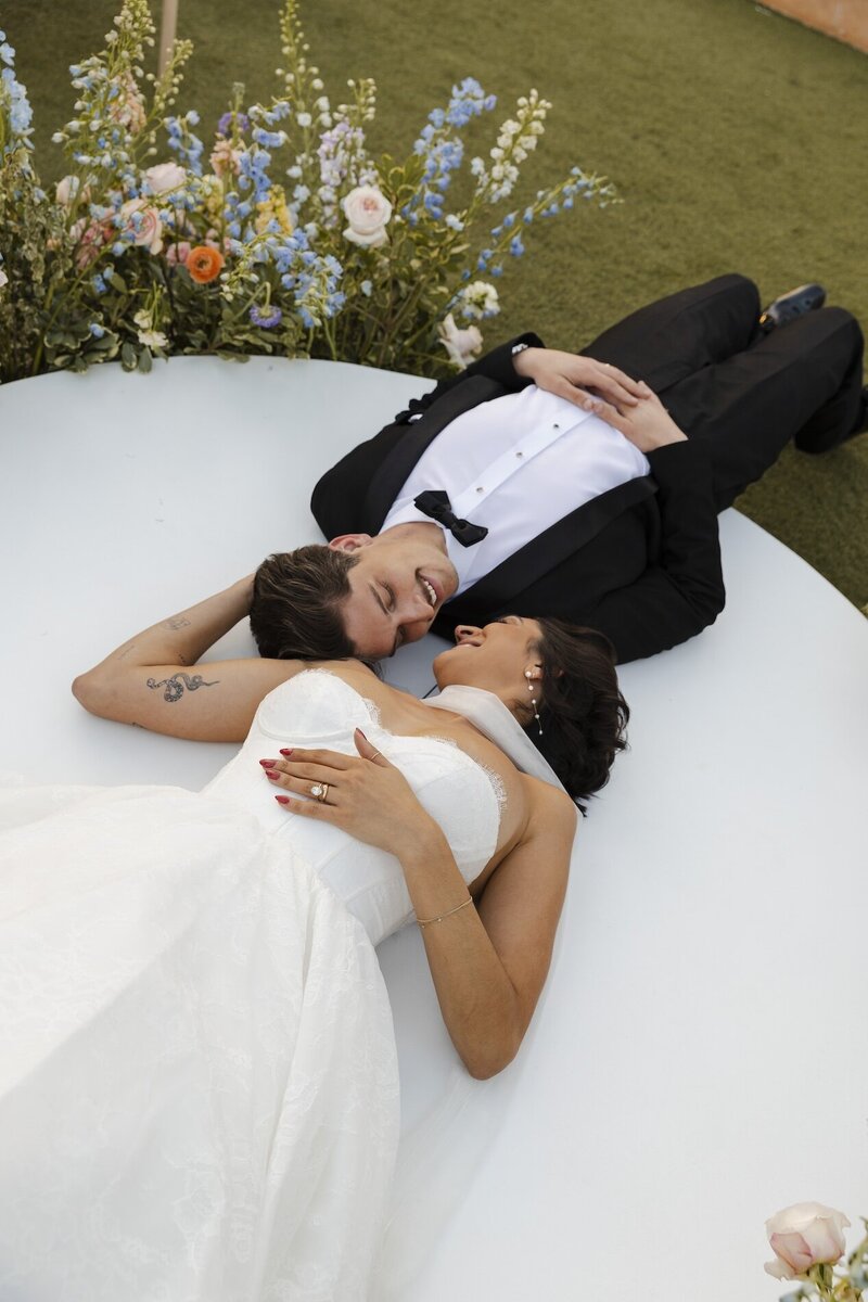 bride and groom embrace after wedding ceremony in phoenix arizona