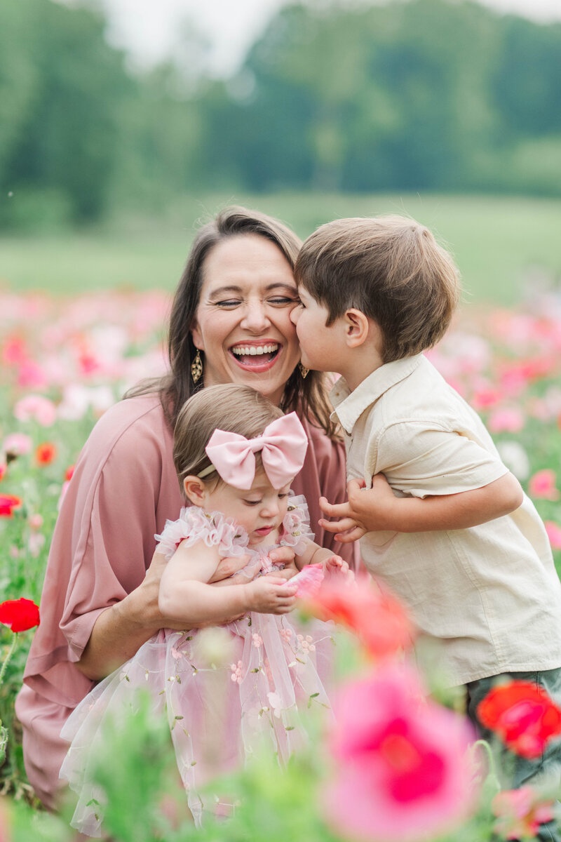 Winston-Salem photographer Emily Richardson holding her child