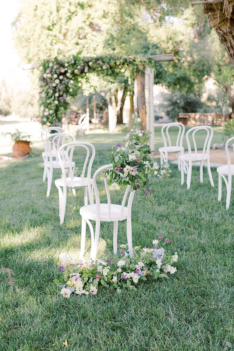 17-radiant-love-events-white-chair-ceremony-floral-alter-outdoors-romantic-elegant-timeless