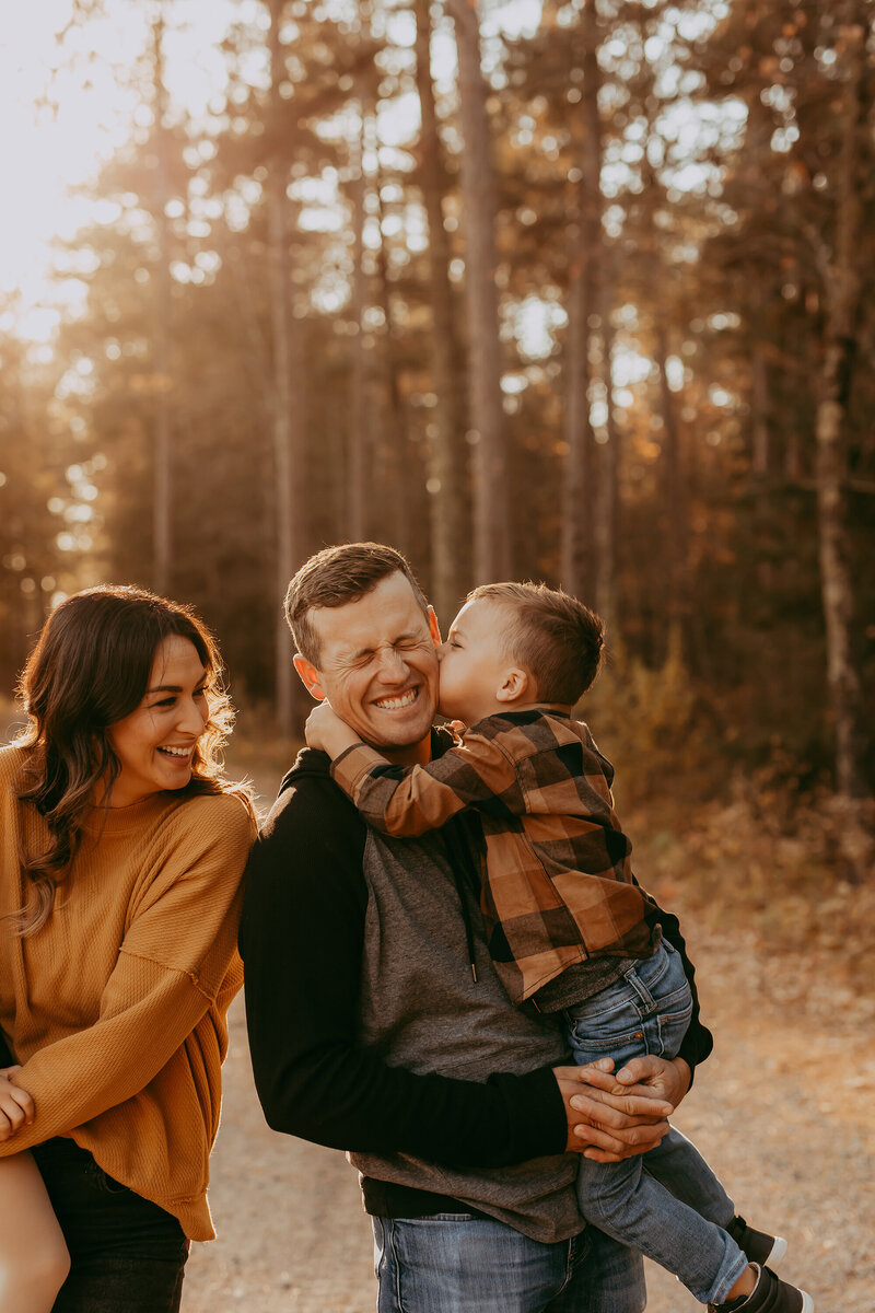 father-and-son-kissing-cheek