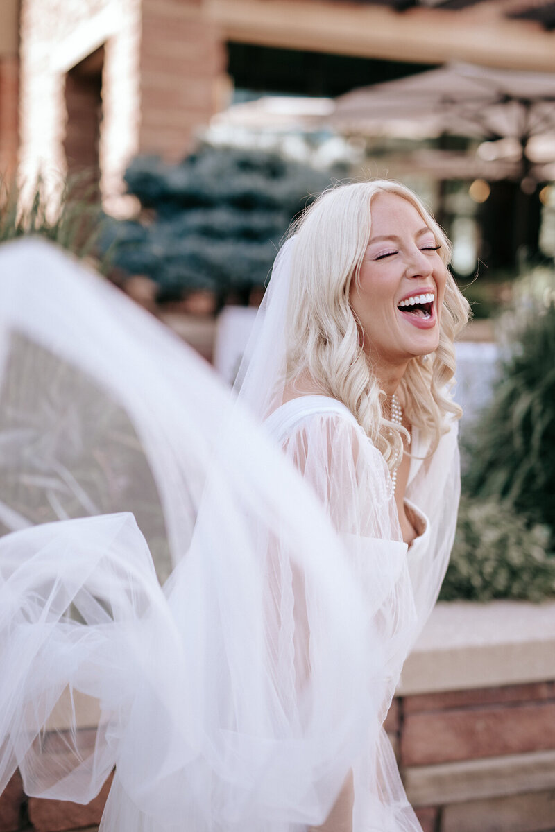 Groom lifting Bride up to celebrate right after saying I do.