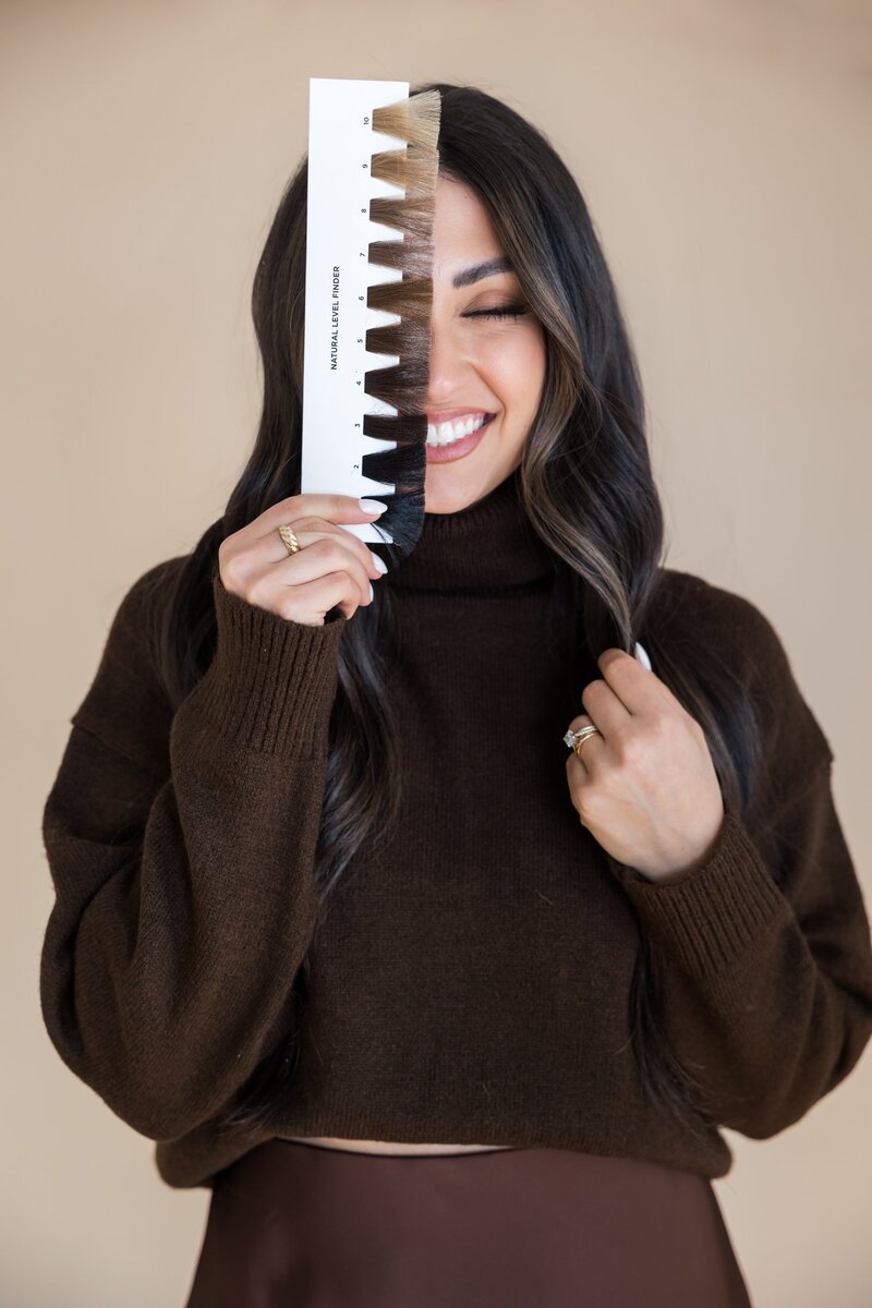 Woman getting holistic facial during brand shoot