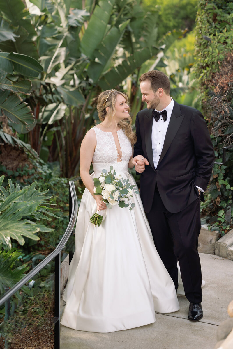 A wedding couple kissing