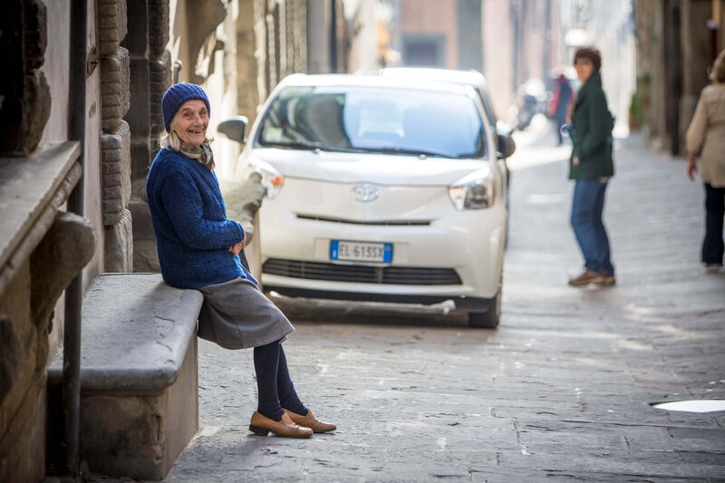woman on street Cortona Italy