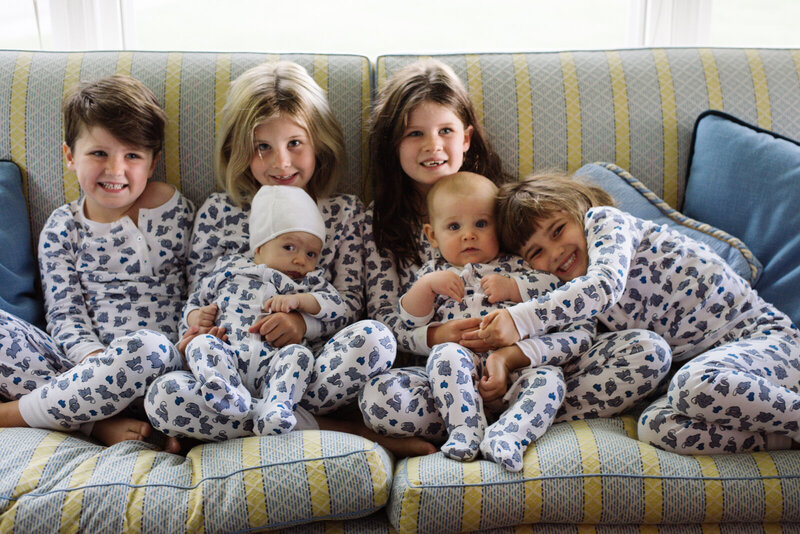 children playing together in matching pajamas