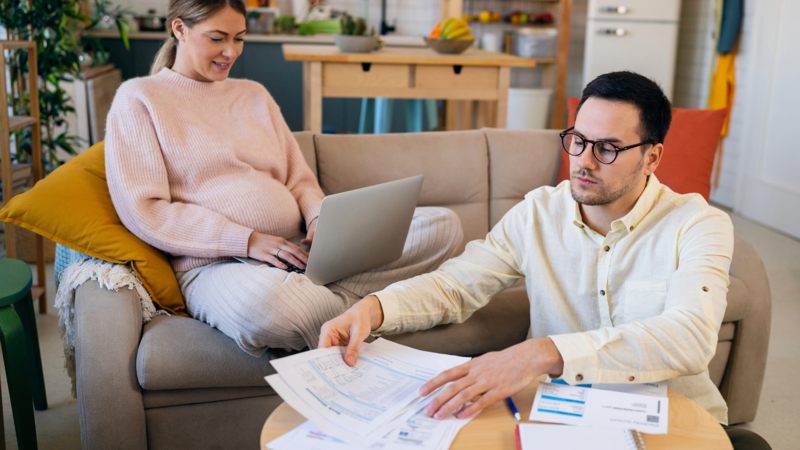 Adults working together in a bright, organized space, reflecting executive function support and ADHD-friendly collaboration
