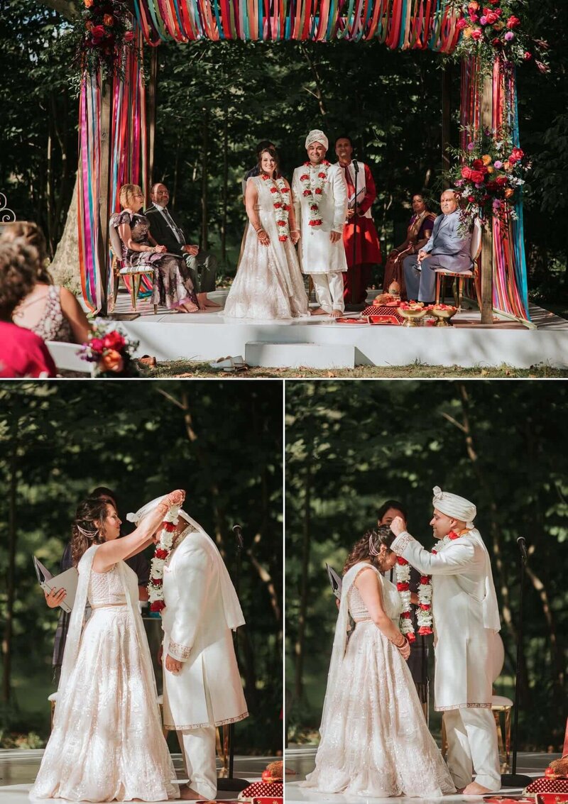 Bride and groom pose for pictures after trading garland at  Bartram's Garden in Philadelphia.