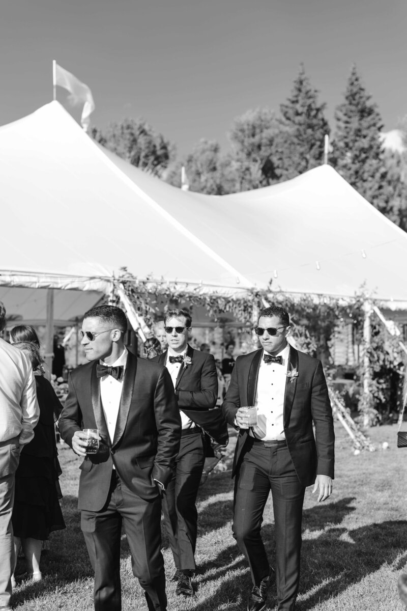 jackson-hole-wyoming-wedding-photography-ceremony-bride-groom-walking-guest