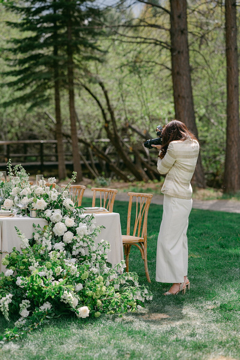 Bride and groom walk back down the aisle after taking vows with confetti in the air