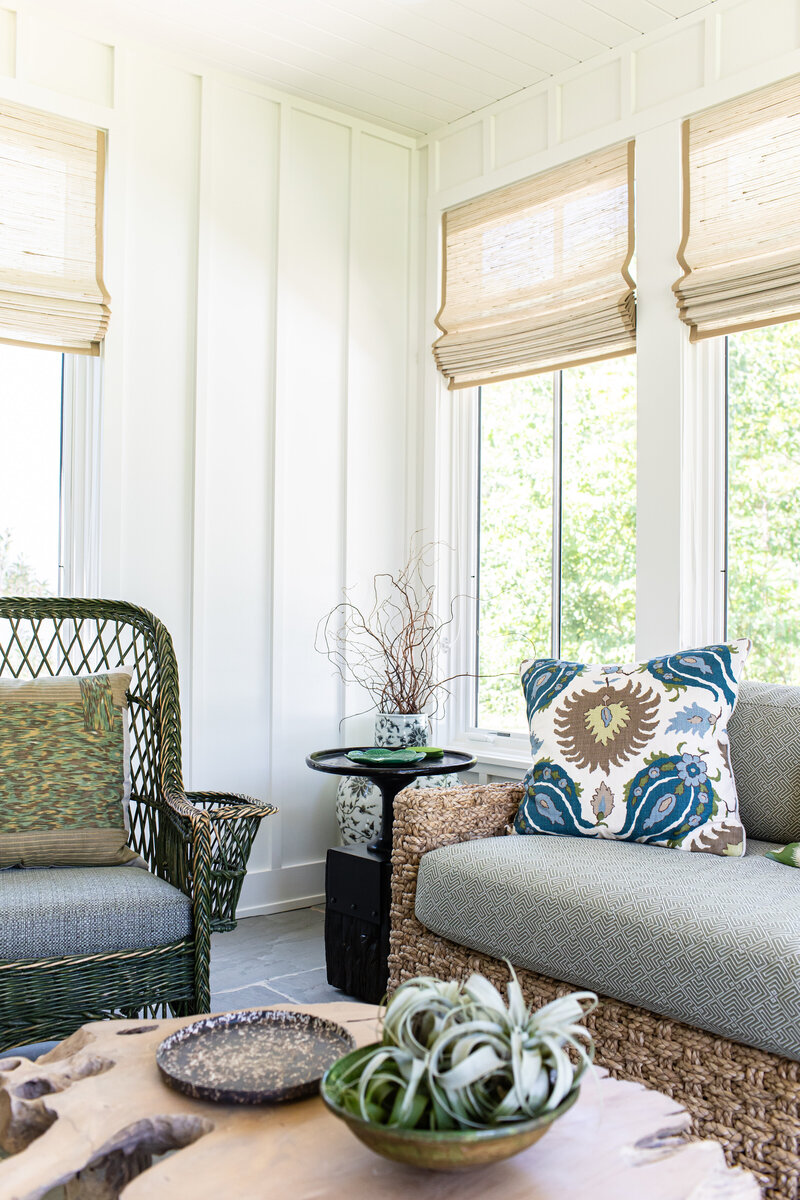 A beautifully designed custom-built living room featuring elegant wall paneling, high-end neutral furniture, and well-made furnishings. The space is styled with a liveable, sophisticated aesthetic, perfect for showcasing luxury interiors.