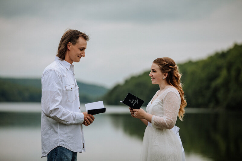bride and groom holding hands and smiling