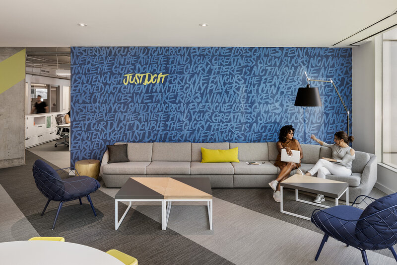 commercial design portfolio nike toronto office lounge blue wall