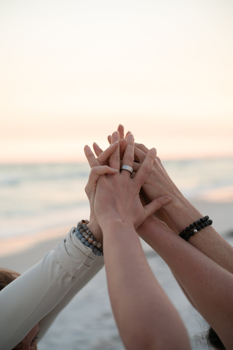 hands all together in unison 