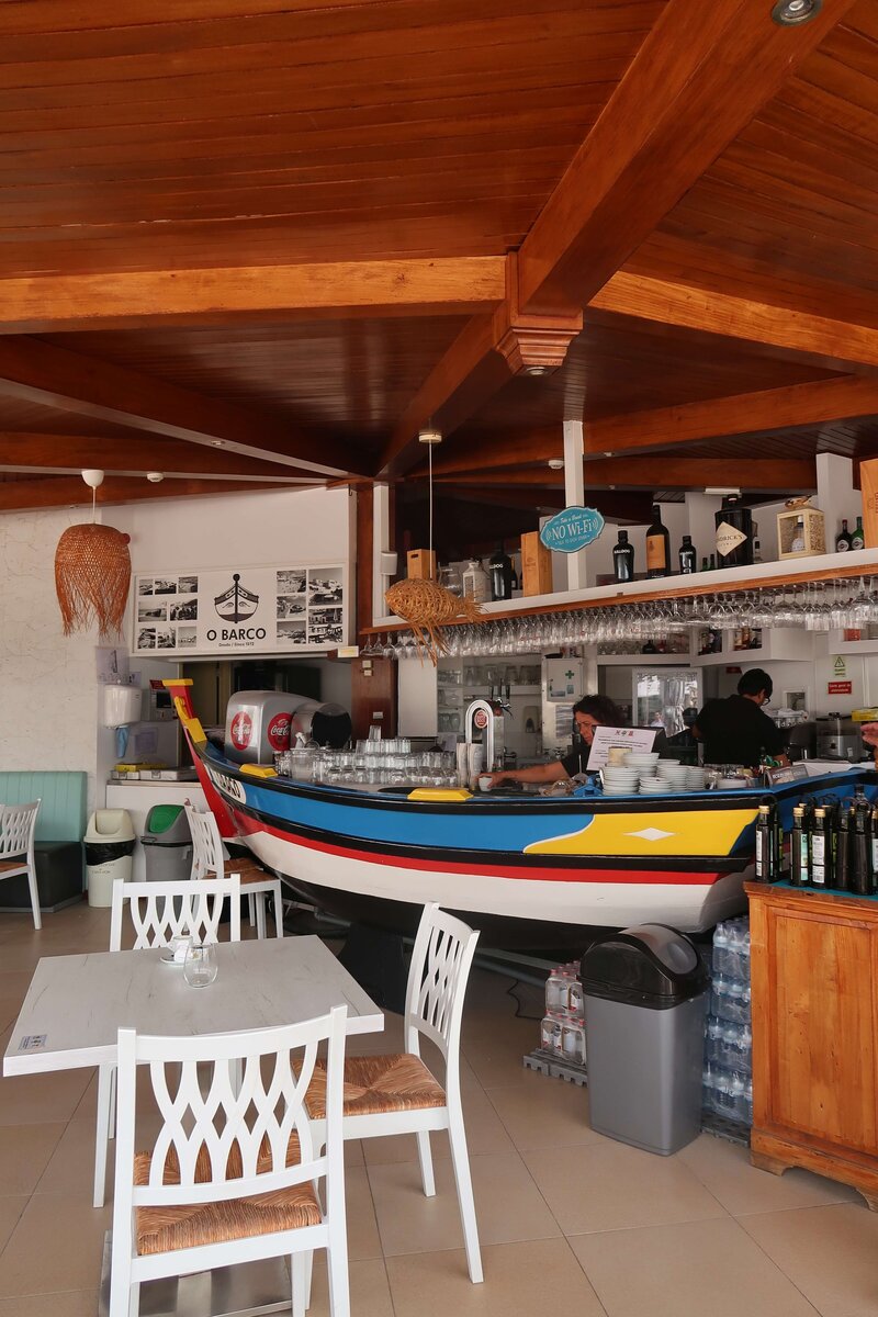 Inside o Barco restaurant with a boat in the restaurant