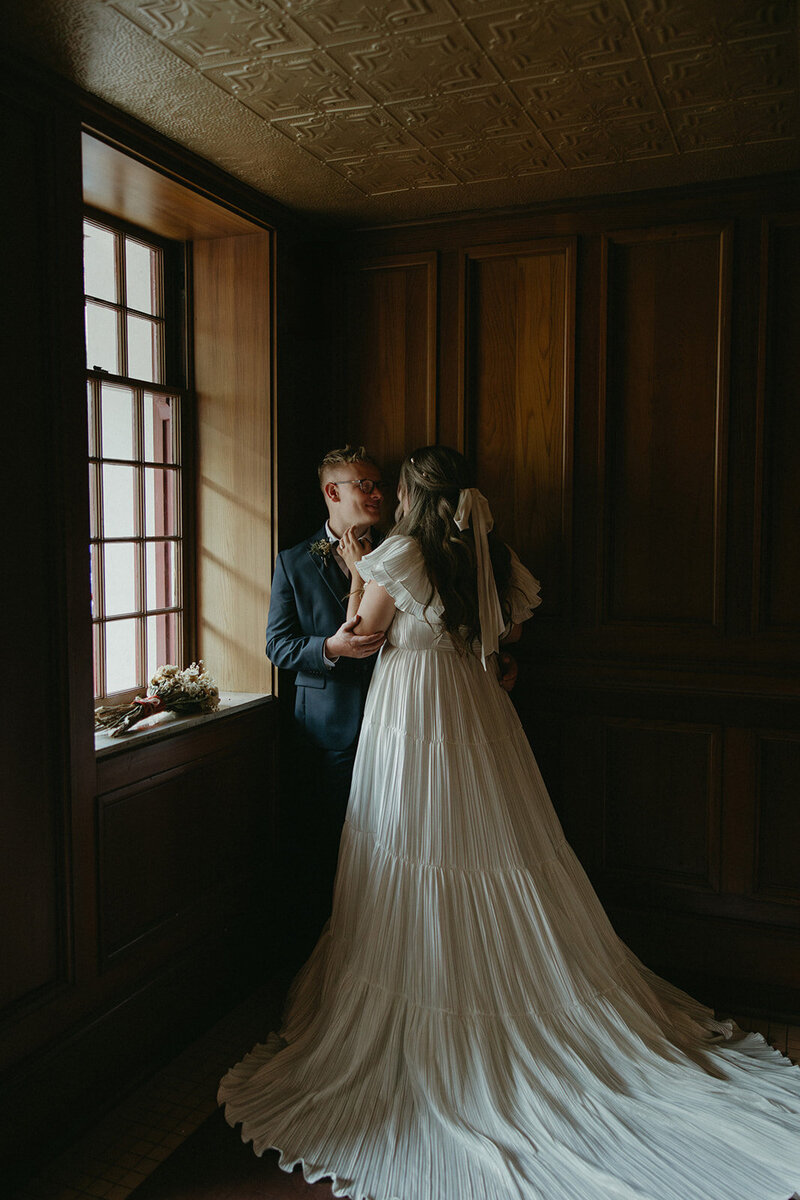 intimate moment of bride and groom on wedding day