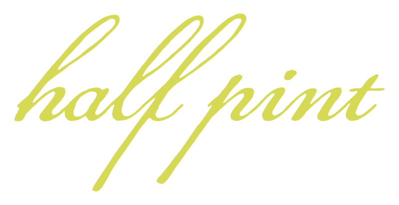 The image shows the words "half pint" written in a cursive, light green font on a transparent background, showcasing the refined touch of a skilled brand designer.