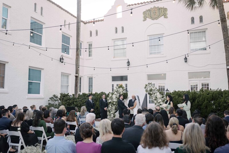 Wedding ceremony captured by Florida wedding photographer at historic Casa Marina
