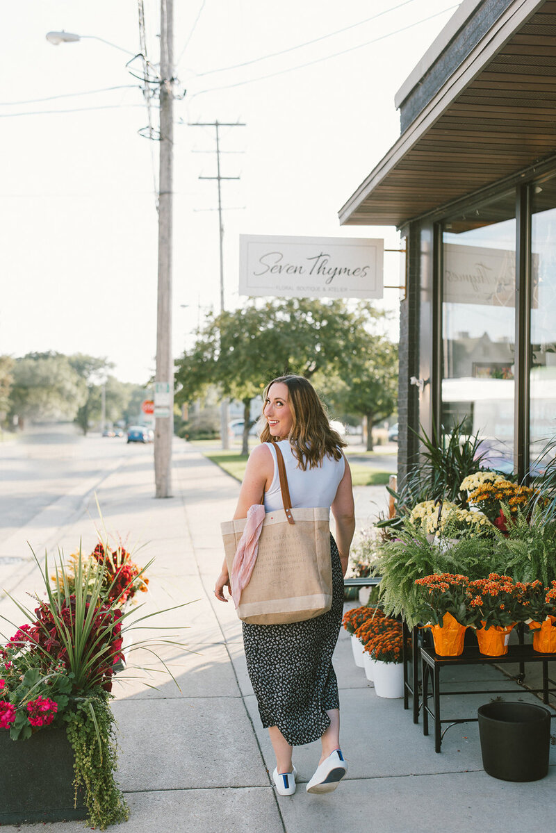 Chloe Dechow, Brand visibility expert, walking down the street