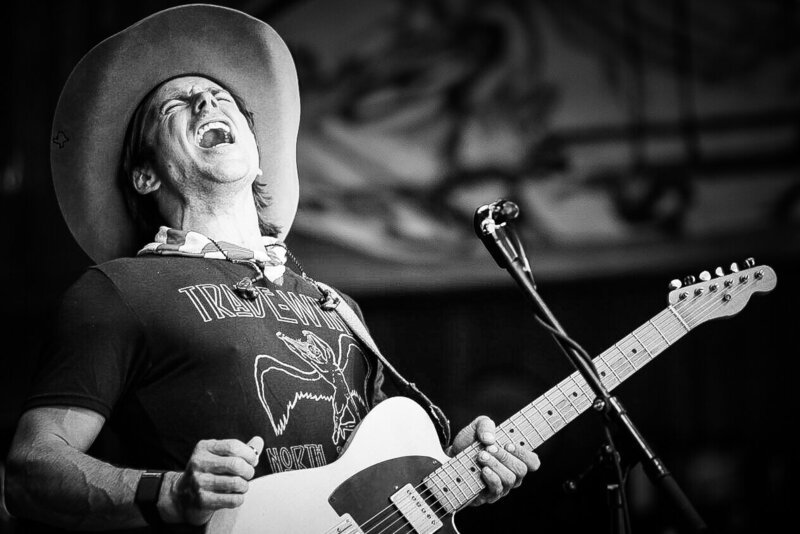 Merlefest Photographer Light Shifter Studios captures images of Lukas Nelson on the last day of the music festival. 