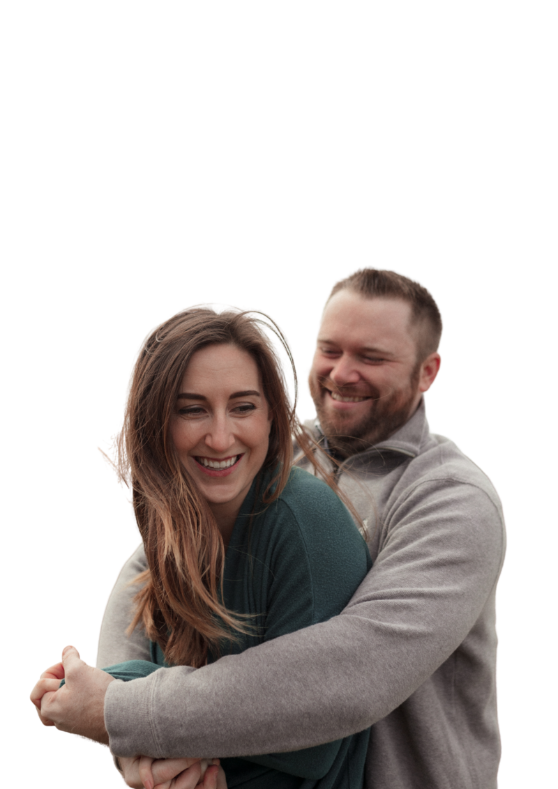 couple embracing laughing