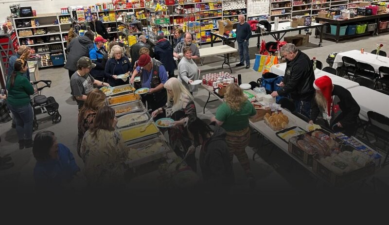 Volunteers preparing supplies at a veteran support initiative run in partnership with Canna Connect