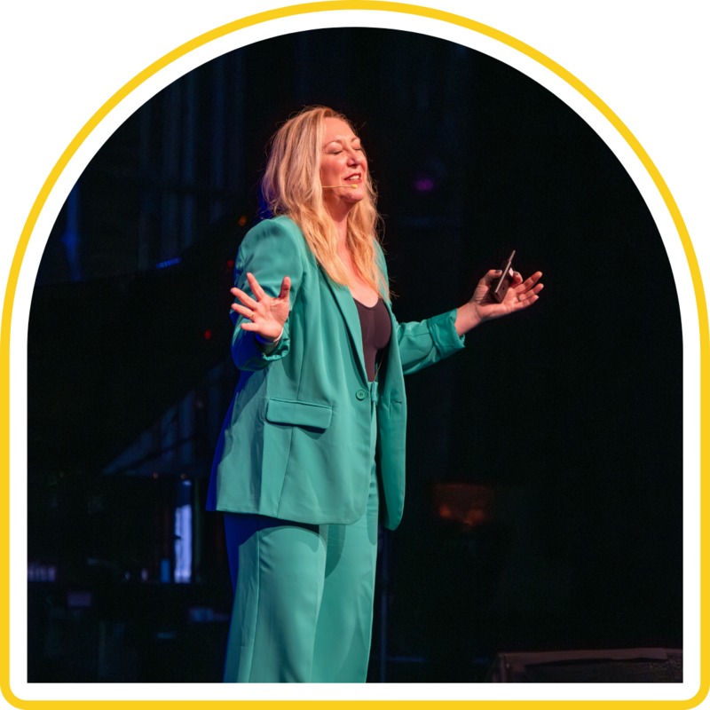 Sally Z delivering keynote on overcoming self-doubt