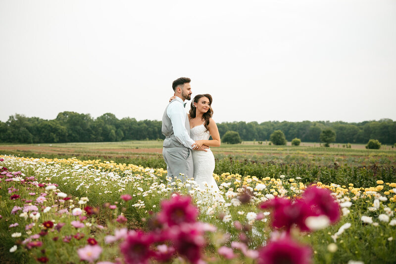 Bride and groom in vibrant flower field at Nashville wedding