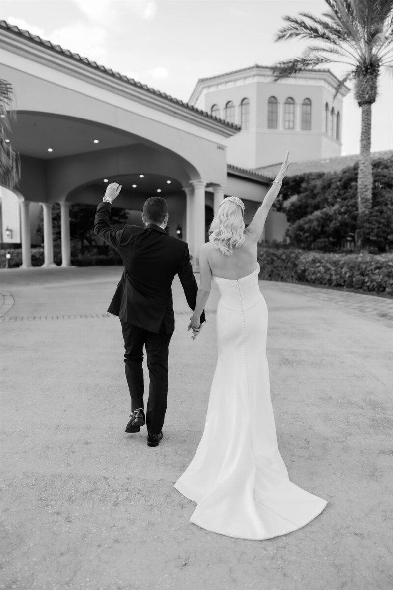 Bride and Groom Portrait on a golf course at the Country Club of Orlando by Orlando wedding photographer