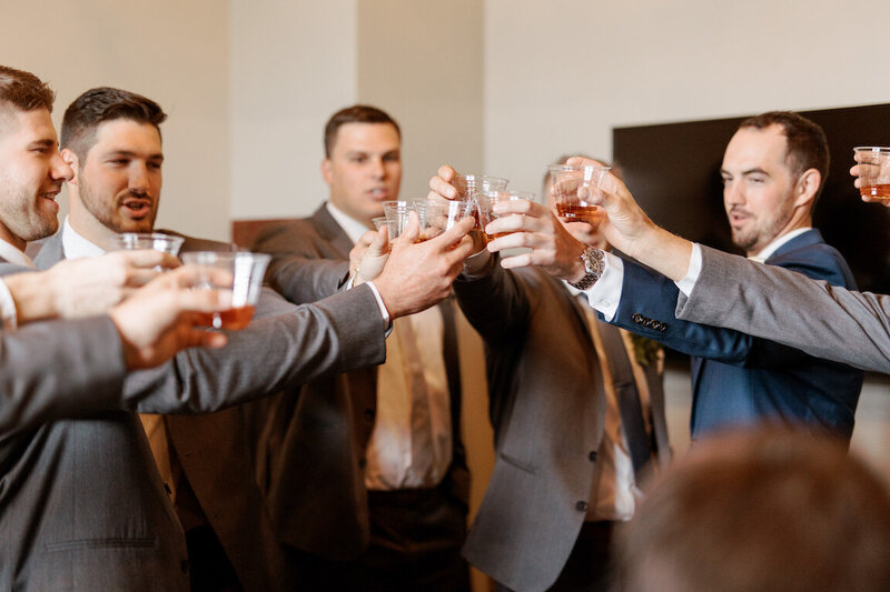Groom preparing for ceremony in the groom’s suite at Canyonwood Ridge