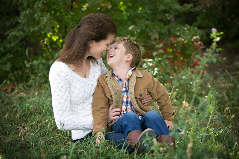 Mom and son taking a photo at Denver Botanical Gardens