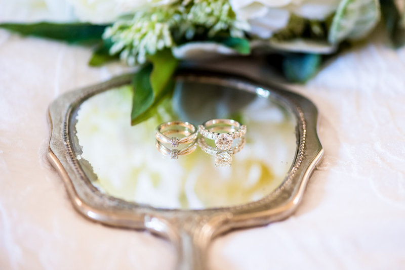 Brides ring on a vintage hand mirror