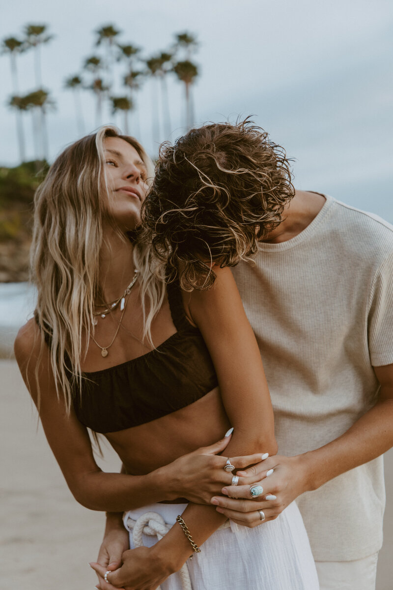 Couple embracing on beach