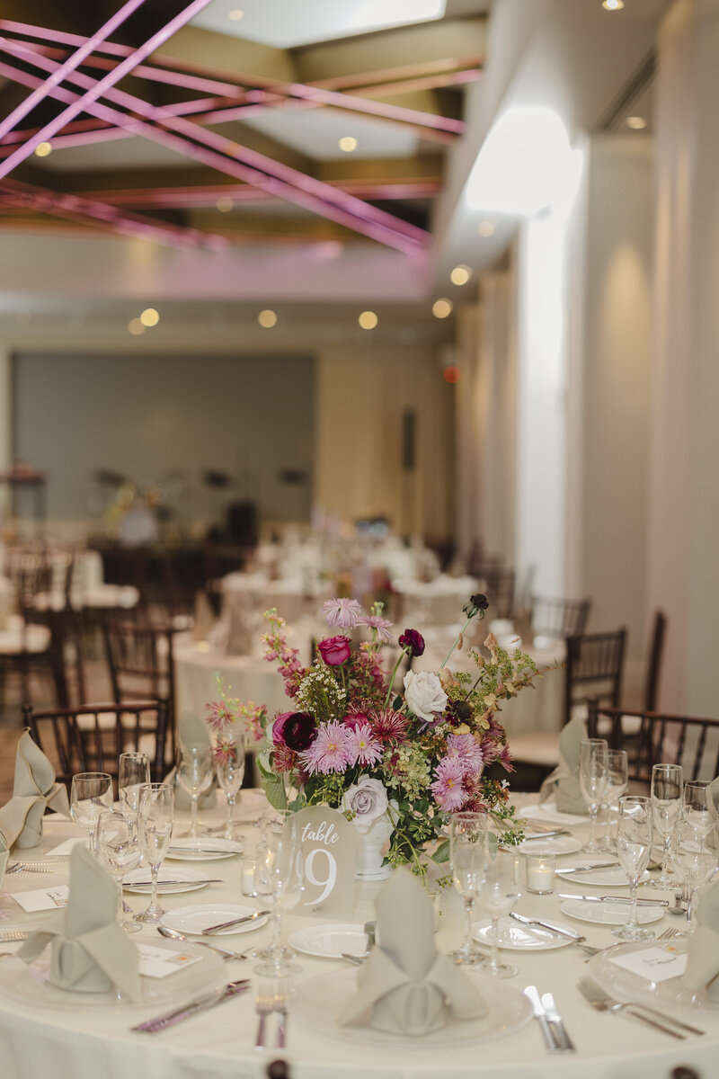 Florals sit on a table at a wedding at Hotel Washington.