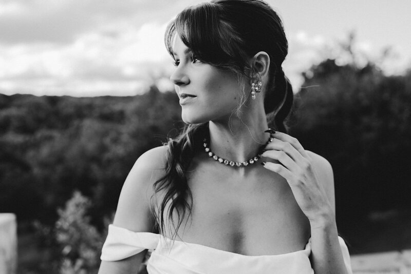 Black and white photo of Bella Rae  Bridal Model  with Pony  captured by Untamed Creative at Nutting Hill Villa