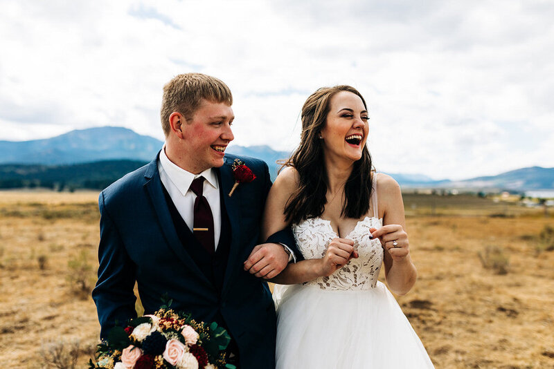bride and groom kiss after their colorado mountaintop elopement