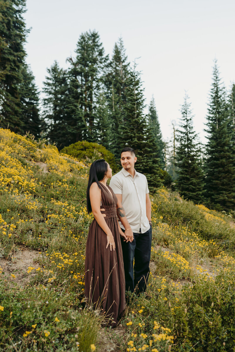 Holding Hands in the Flowers | Photography  by Jocelyn