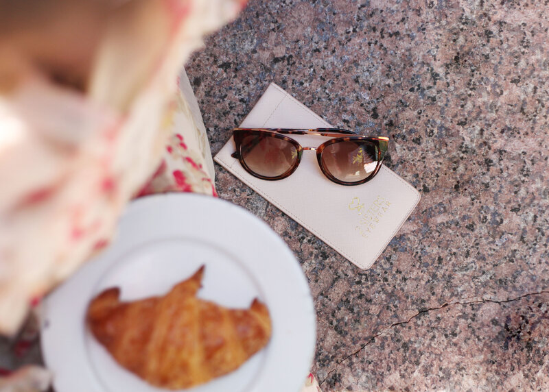 sunglasses and croissant