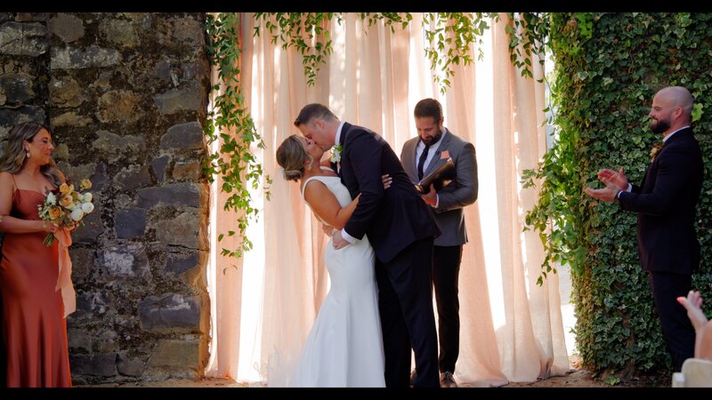 bride and groom kissing