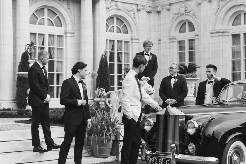 wedding couple in front of classic car rolls royce