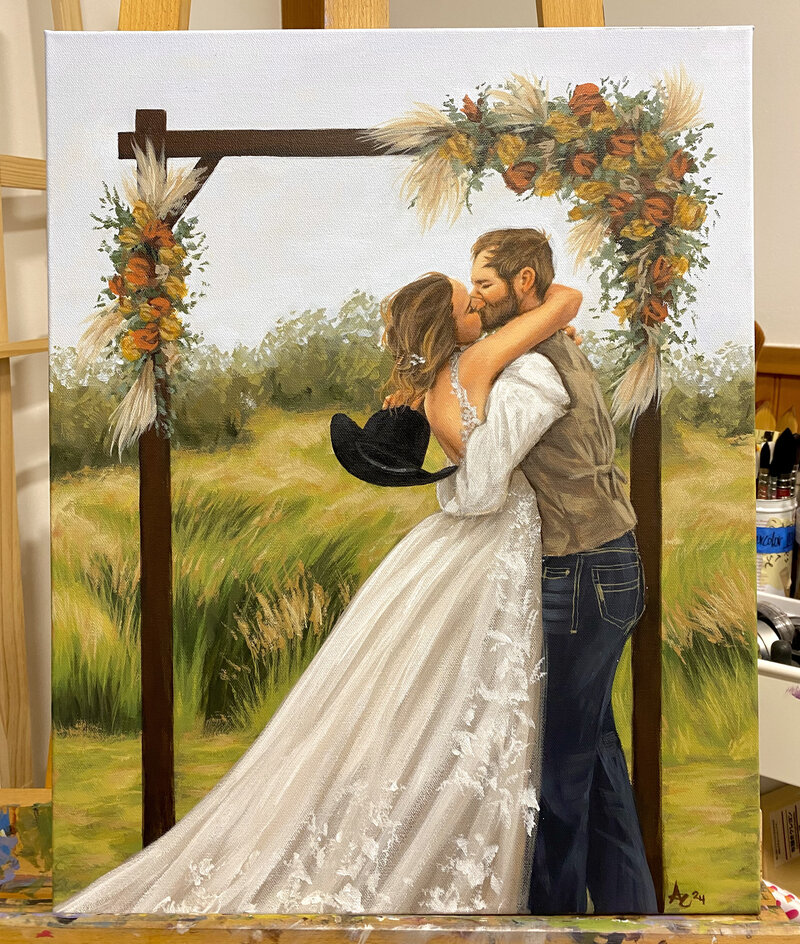 A portrait of a married couple kissing at an outdoor alter. 