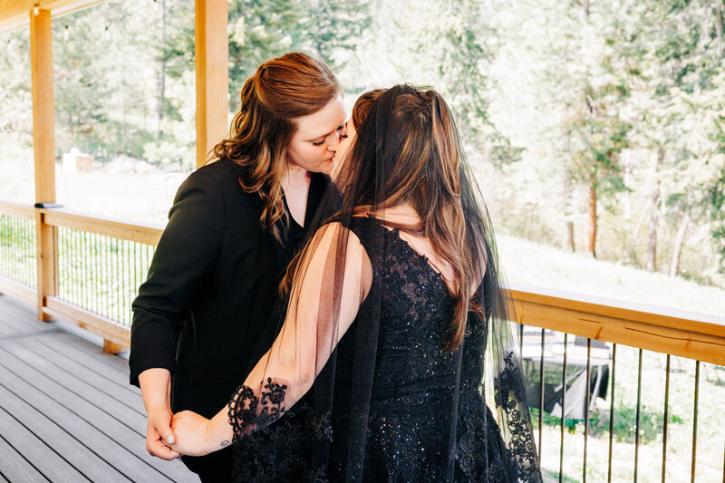 Montana same sex brides embracing during first look