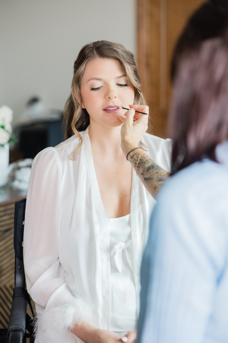 Bride getting her makeup done at a wedding in West Palm Beach at the Ben