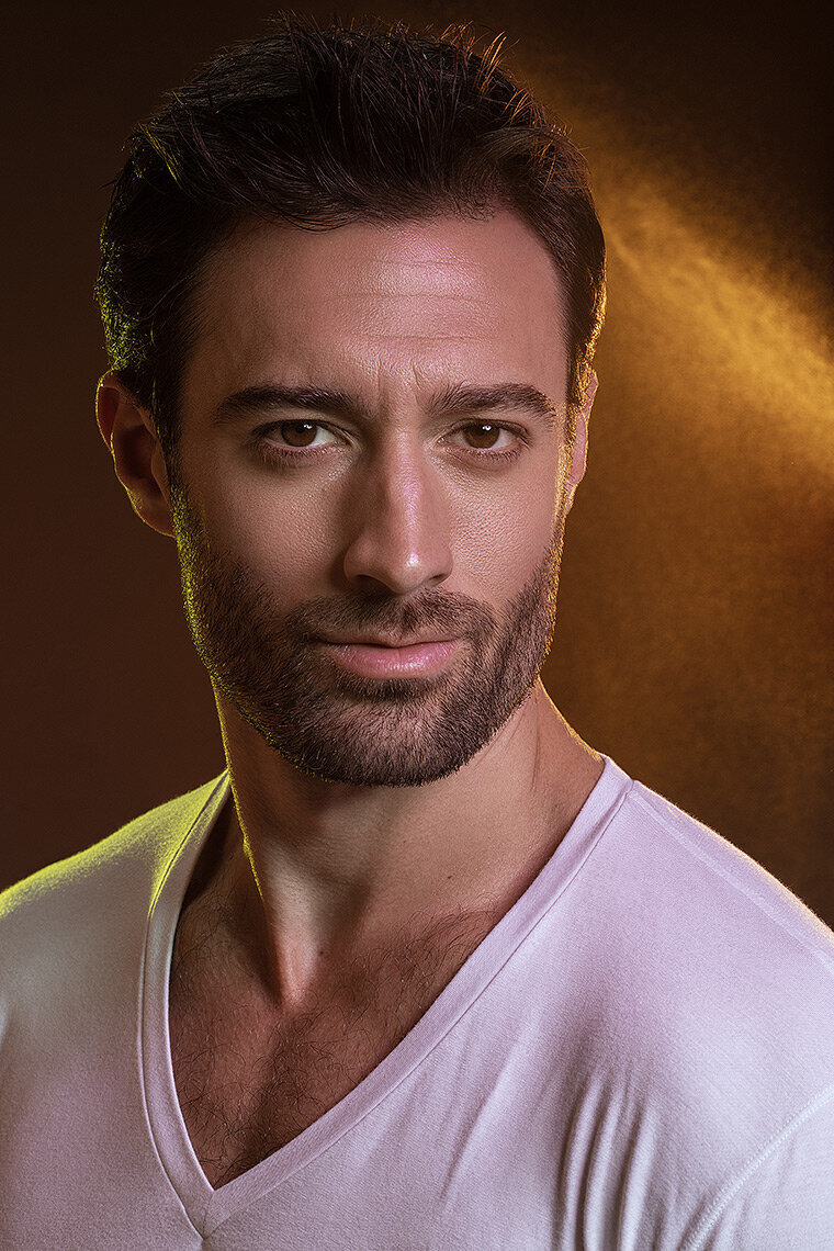 Studio portrait of Jared with a relaxed and confident expression, photographed by Ylva Erevall.