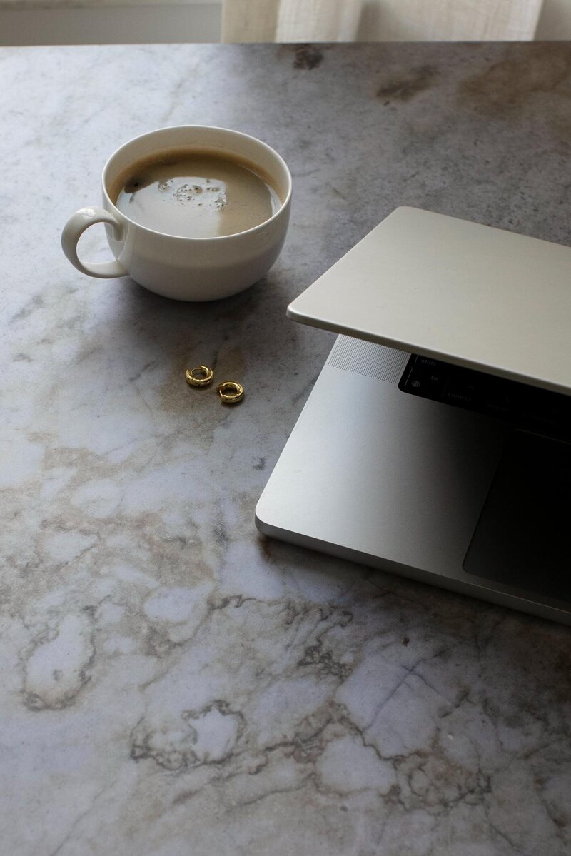 Laptop and Coffee on Counter