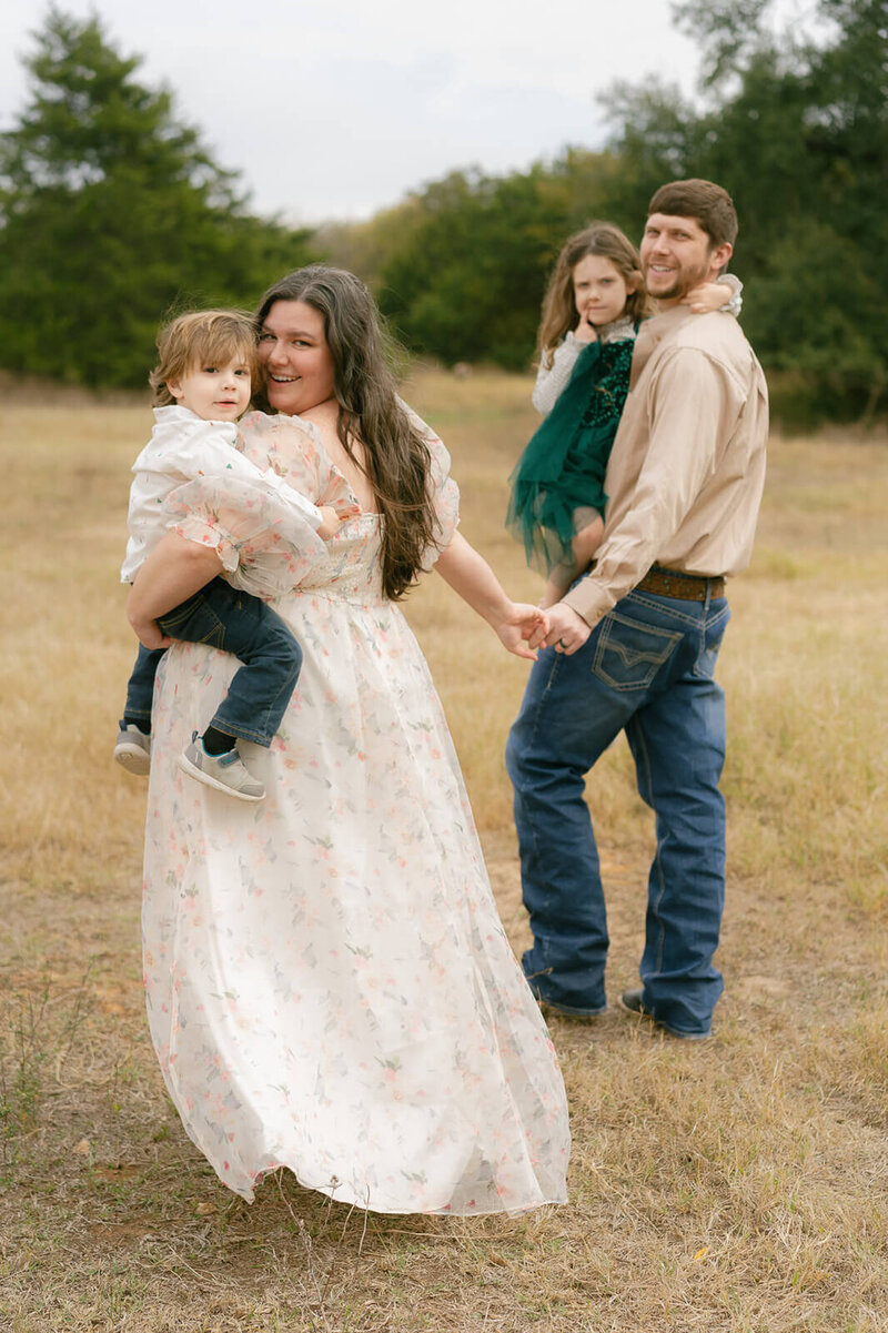 Brooke's family in a field