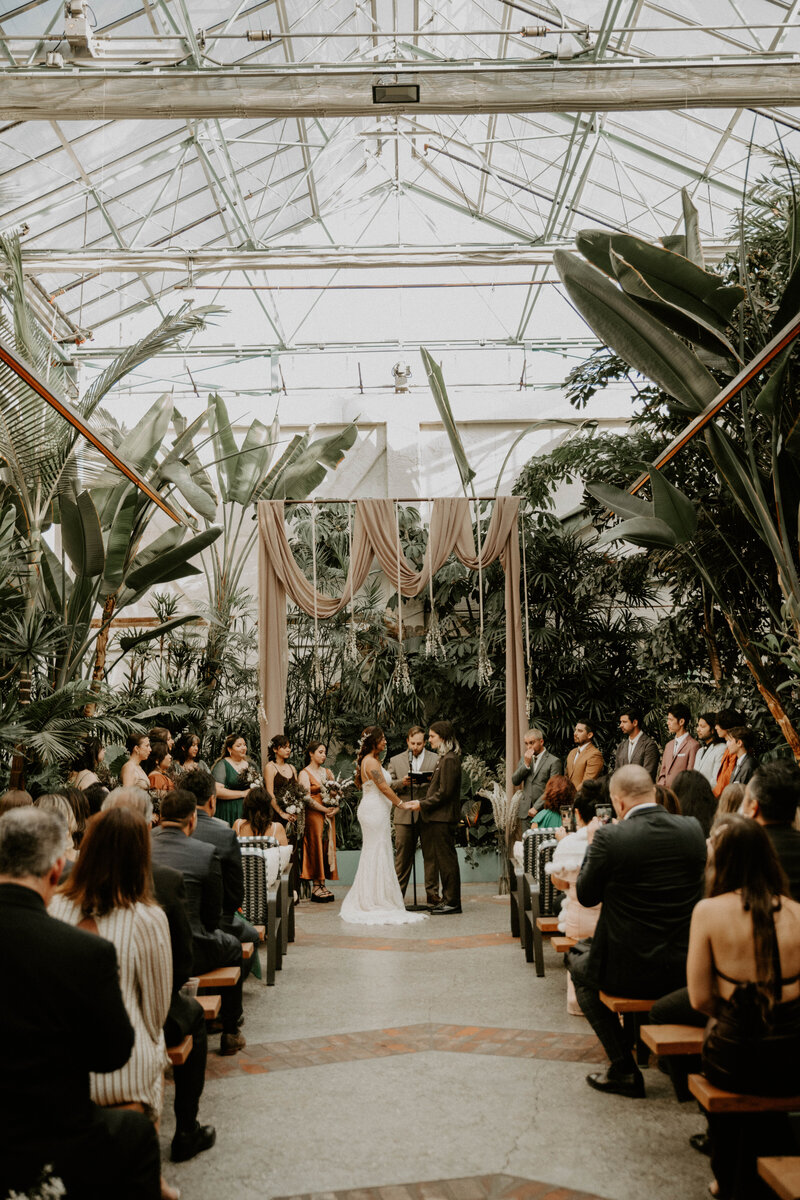 bride and groom exchanging vows